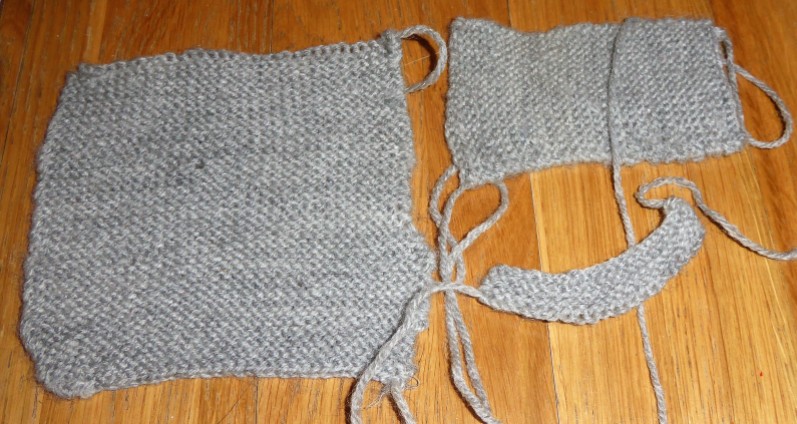The knitting on this one is even worse. Holey and wobbly edged. It became...
