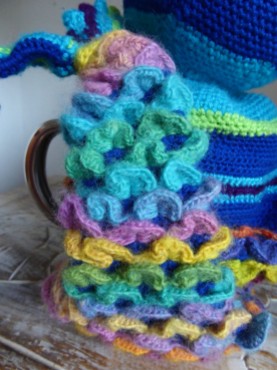 The dragon scales take up a lot of yarn, but show off the rainbow graduation nicely. I used two different rainbow yarns.