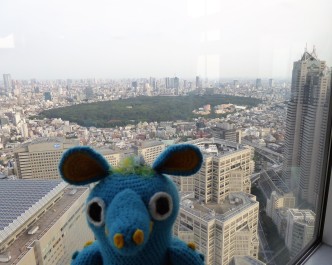 Mr. Bobbles getting an overview of the city from the South Observation Tower at the Tokyo Metropolitan Government Buildings. (Free!)